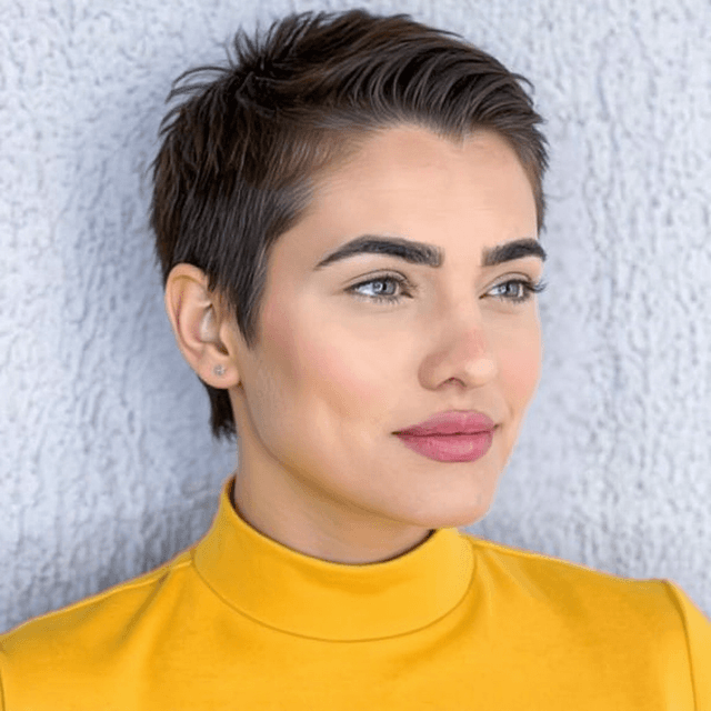 A person with a Sideswept Pixie hairstyle